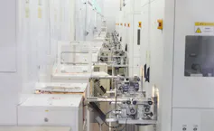 Rows of big white boxes housing giant renewable energy batteries