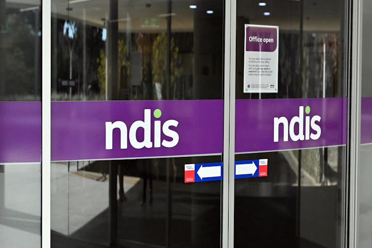 sliding doors with NDIS logos