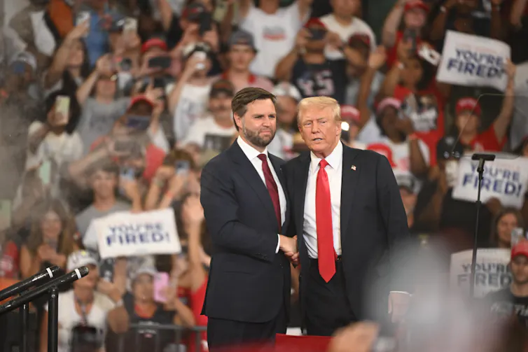 Donald Trump and his vice-presidential pick, J.D. Vance on stage in Ohio, August 2024.