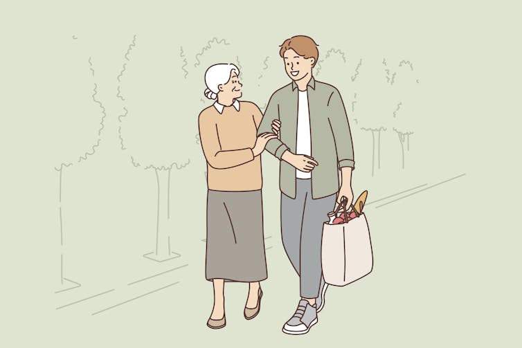 Boy walking with old lady