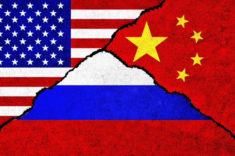 A composite image showing the U.S., Russian and Chinese flags.