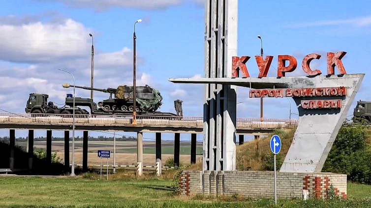 Russian troops moving on highway in Kursk.