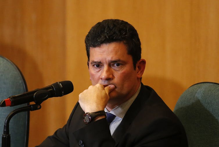 Sérgio Moro taking questions at a press conference.