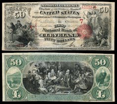 The front and back of a fifty dollar note. Front view includes two scenes includes these words: this note is secured by bonds. The back is printed mostly in green ink.