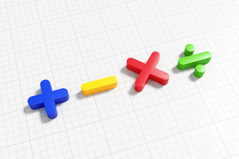 Symbols for addition, subtraction multiplication and division on graph paper