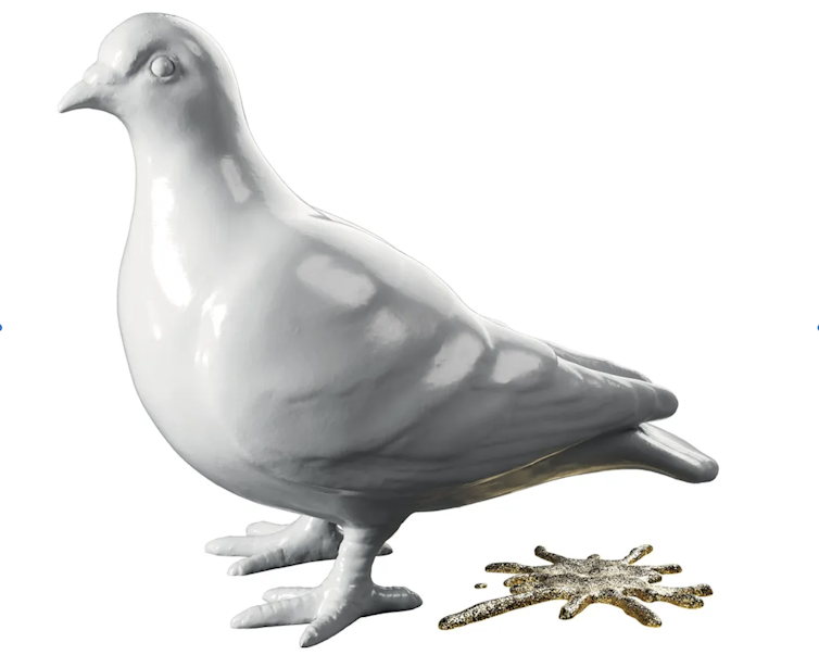 White porcelain pigeon with a gold poop splatter