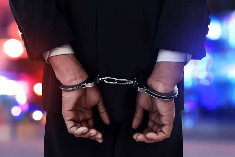 businessman in handcuffs