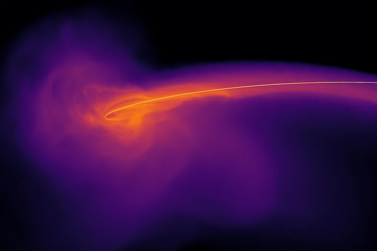 A swirling mass in purple colours with an orange core on a black background.