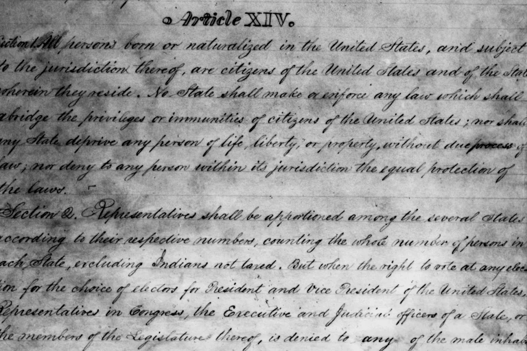 Old-fashioned writing on a sheet of paper.
