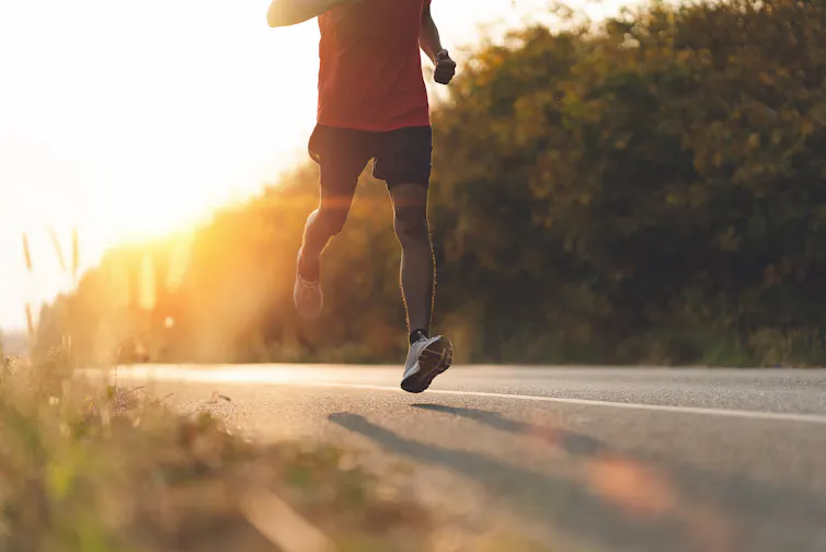 A man running on a road.