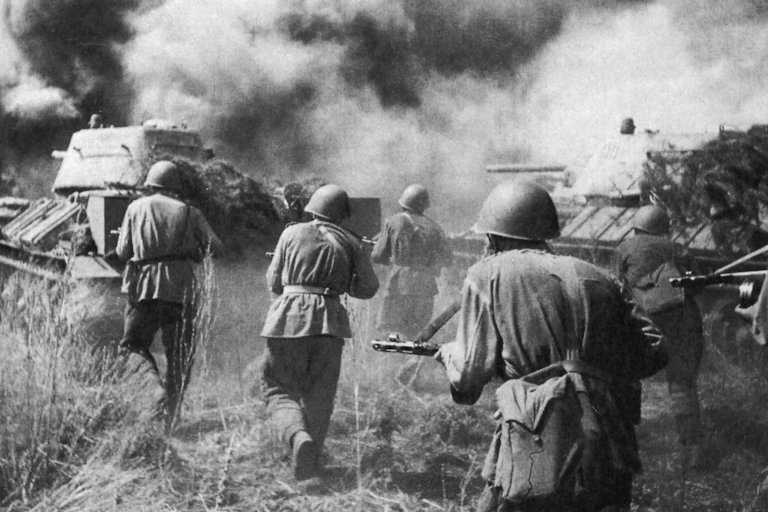 Second world war battle featuring Red Army troops and Soviet T-34 tanks.