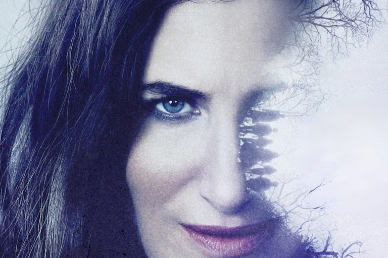 Kathryn Hahn looking to camera.