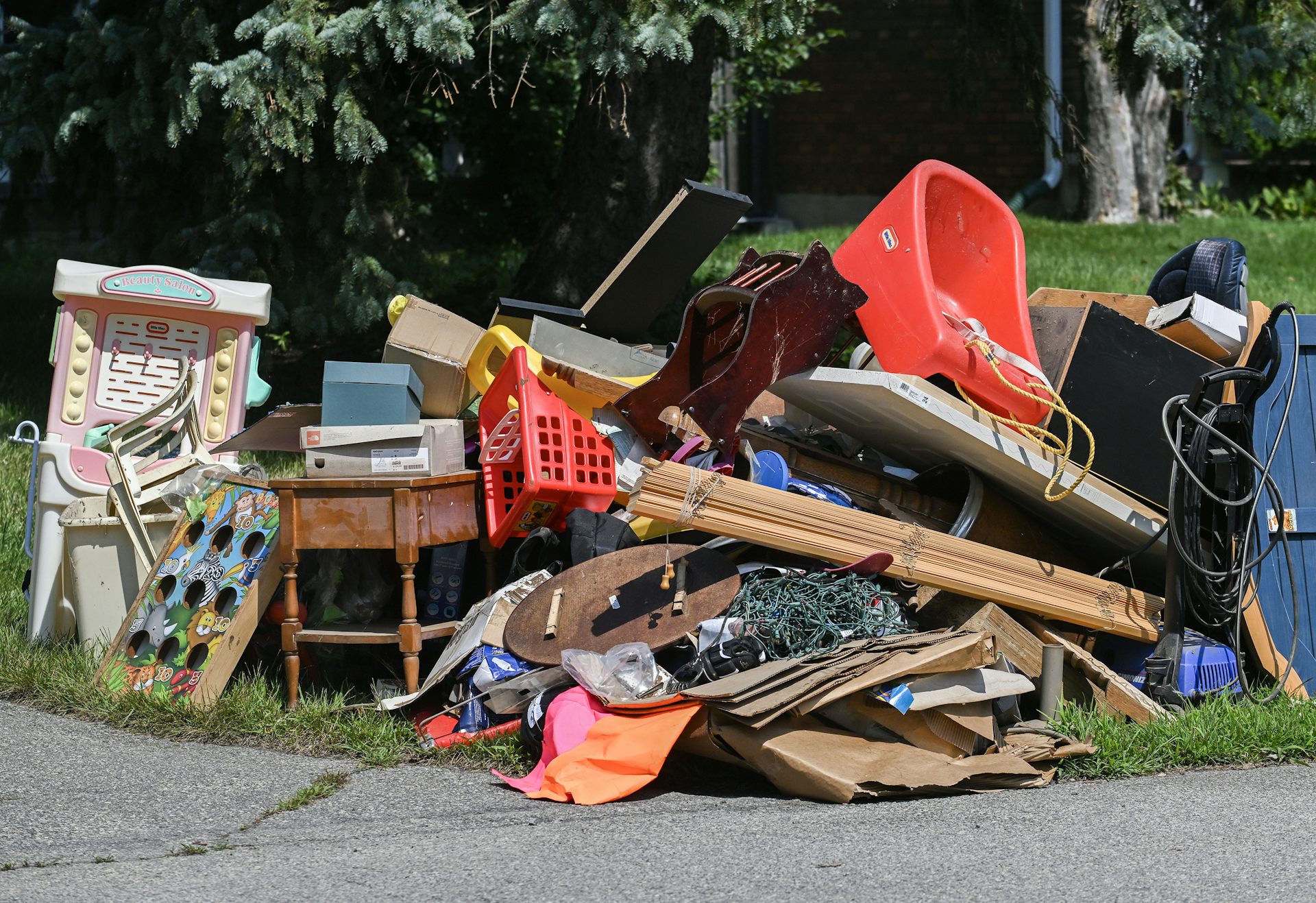 Furniture and household goods lying on the grounds of a house