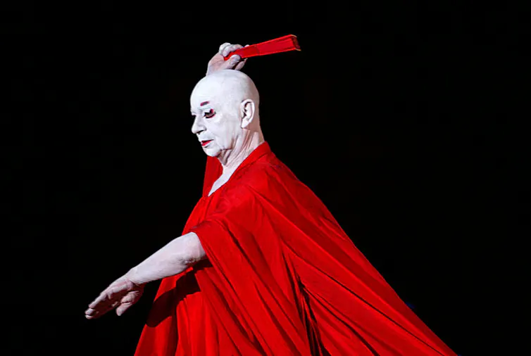 Dancer, choreographer and mime Lindsay Kemp performs on stage.