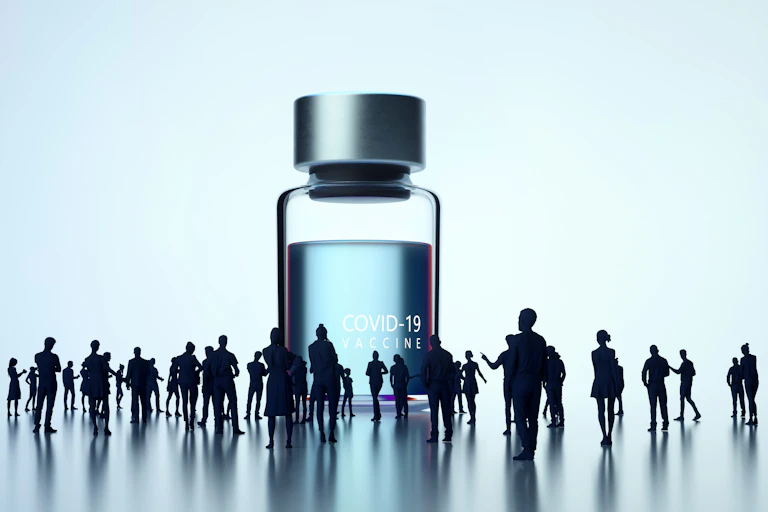 Graphic of silhouetted human figures around a bottle labelled Covid-19 vaccine