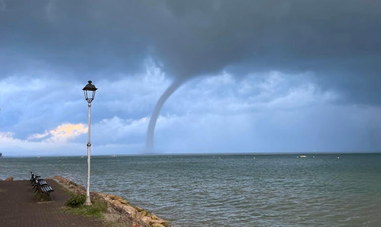 A tornado over a lake.