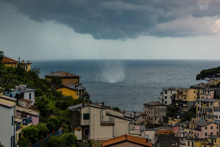 A stormy coastal scene in Italy.