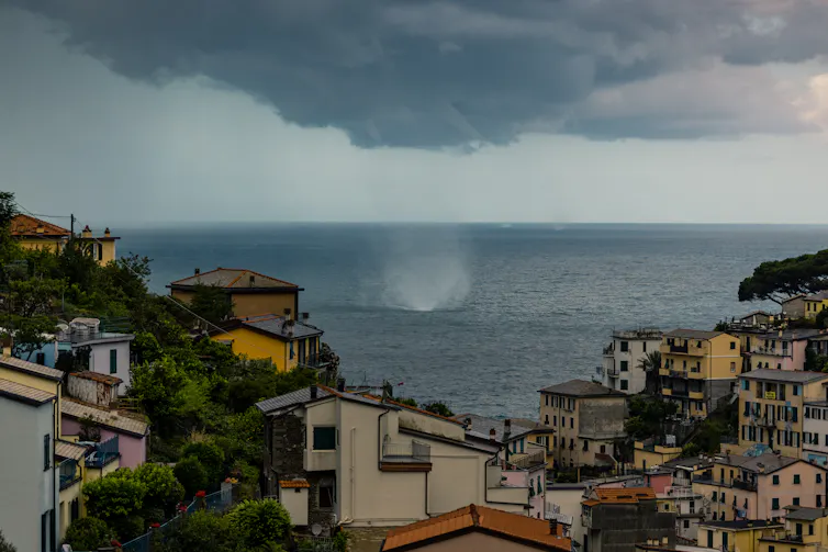 A stormy coastal scene in Italy.