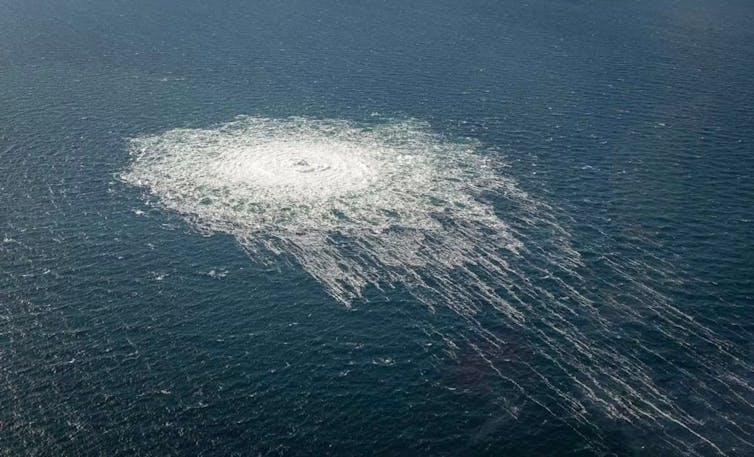 Ripples are seen on the surface of a body of water.