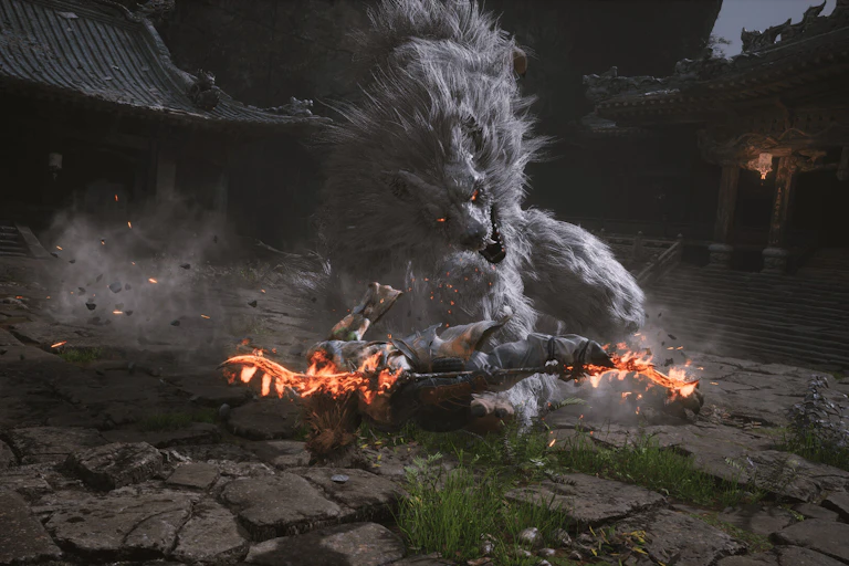 A still from a video game shows a giant grey wolf-life creature.