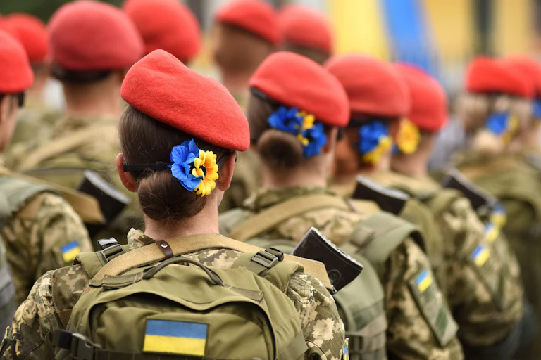 Ukrainian women soldiers in uniform during a training session.