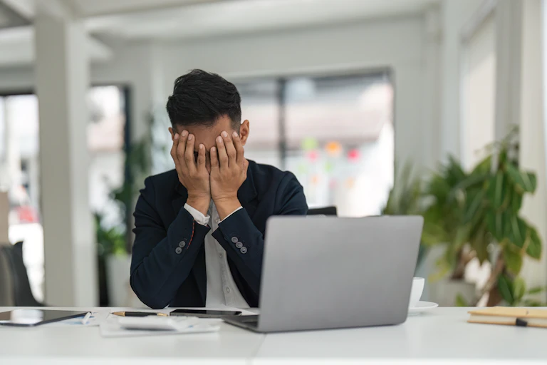 A man stressed at work