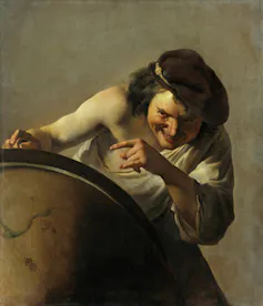 Demócrito, máximo exponente de la escuela atomista griega (s. V a. e. c.), retrato por Johannes Moreelse en la actitud jocosa con la que se identificó al filósofo. Wikimedia commons