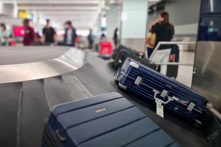 luggage on airport conveyor belt