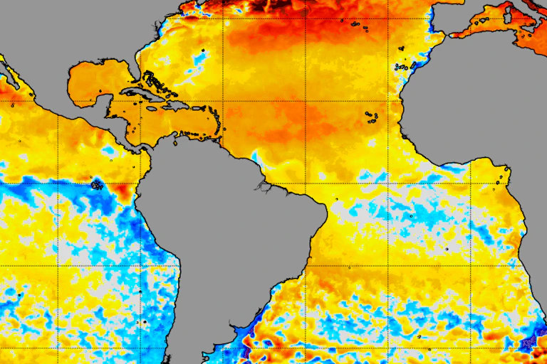 A map shows cooling almost outlining the equator across the Eastern Pacific and Atlantic oceans.