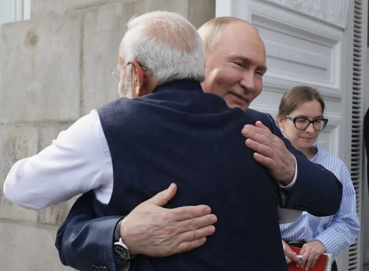 Indian prime minister Narendra Modi hugging Russian president, Vladimir Putin