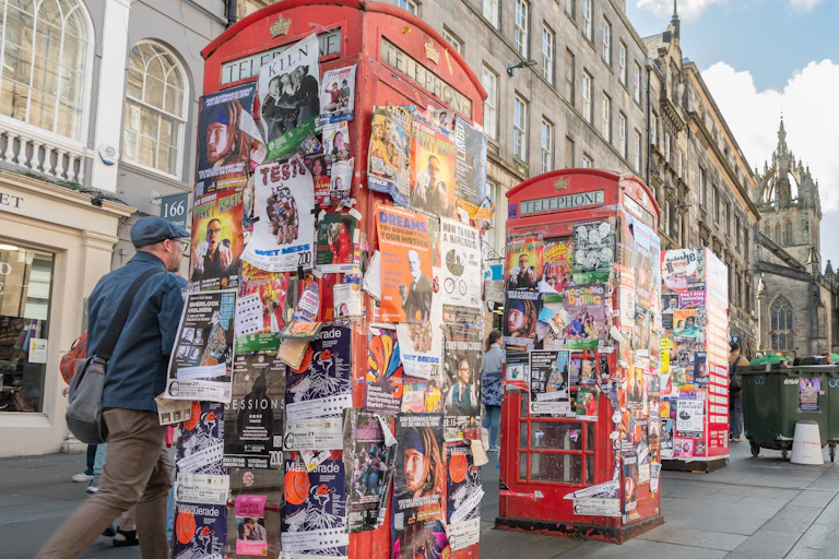 Flyers covering telephone boxes