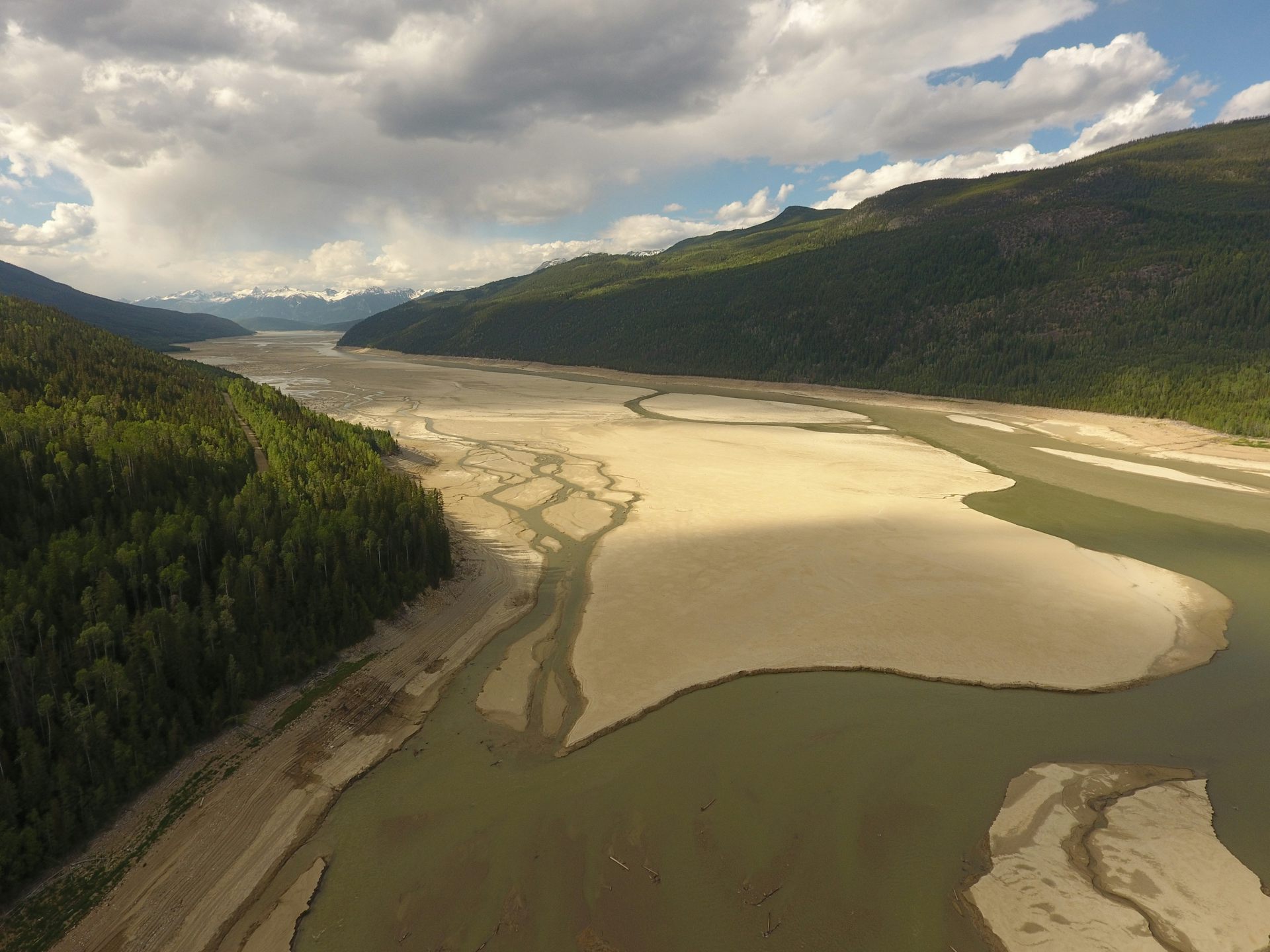 A dry lake bed is seen in a river valley.