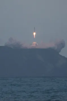 Rocket Lab's Electron rocket lifts off from its launch site in Mahia
