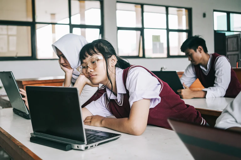 Students appear bored while in class.