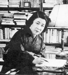 Fumiko Hayashi sat at a desk
