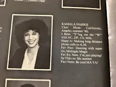 A black and white yearbook photo of a smiling young Black woman.