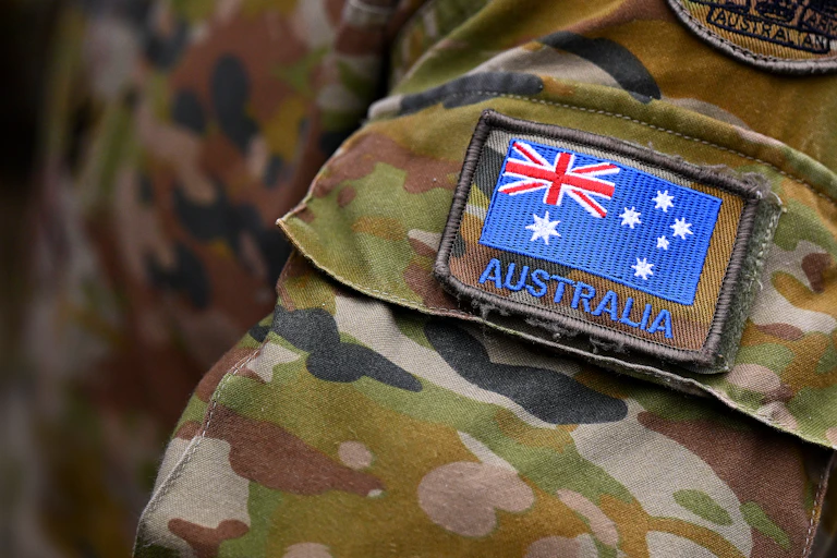Detail of an Australian flag pictured on the uniform of Australian Army personnel