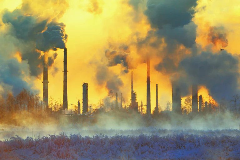 Smoking pipes and smog of an industrial zone