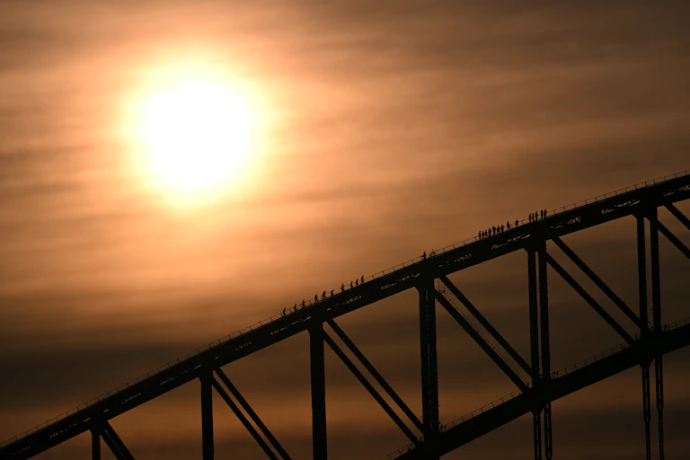 sun and top of bridge