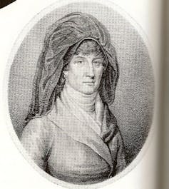 Illustration of a middle-aged woman with hat and scarf.