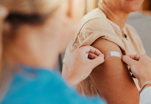 Flu shots play an important role in protecting against bird flu. But not for the reason you might think