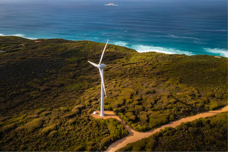 giant wind turbine seen by the coast