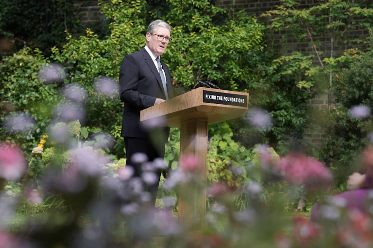 PM Keir Starmer delivering a speech in the Downing Street Rose Garden