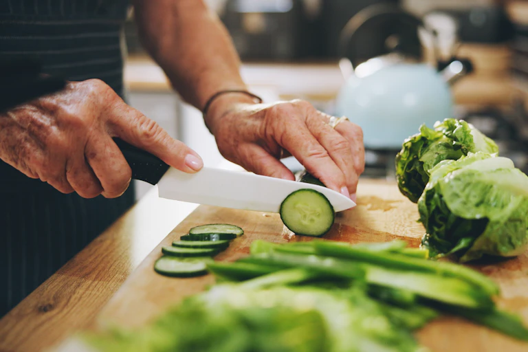 Person chopping greens