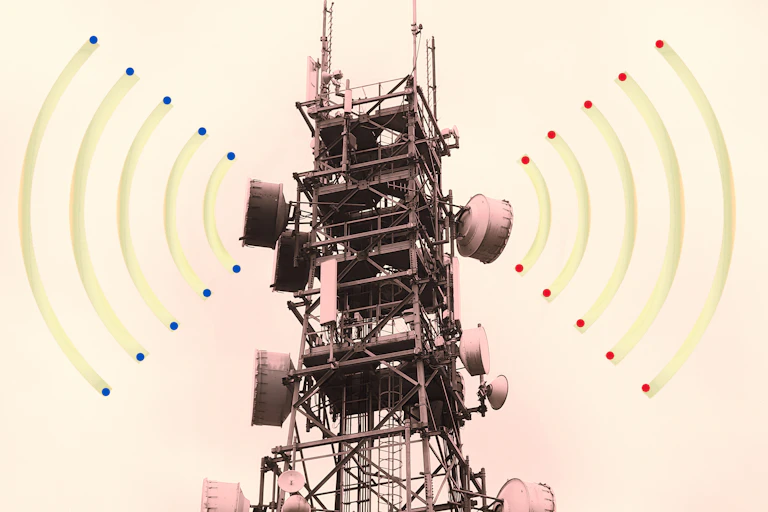 Old-fashioned radio tower emitting red and blue waves