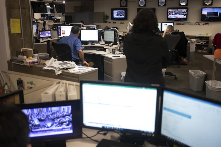 Journalists at work at the AP