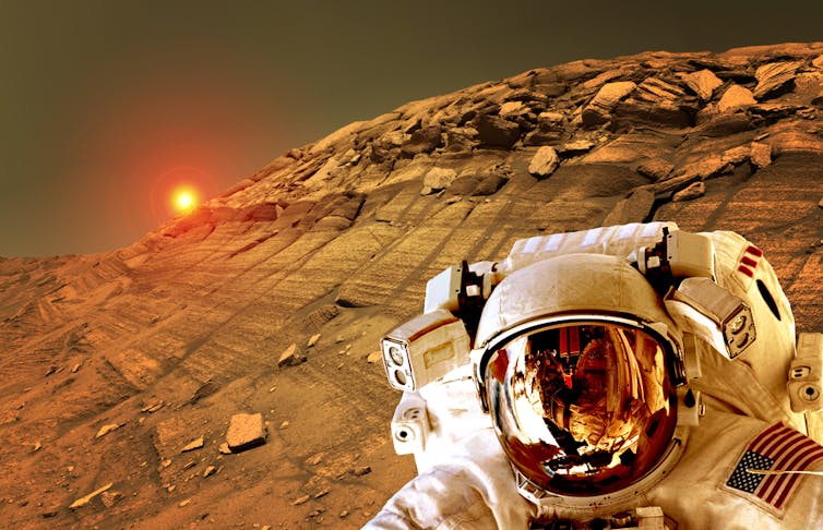 Astronaut on Mars, Sun in background