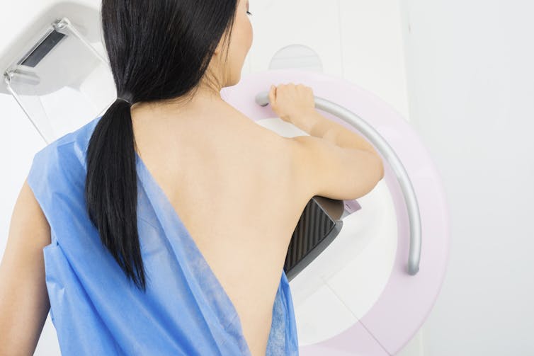 Woman having mammogram