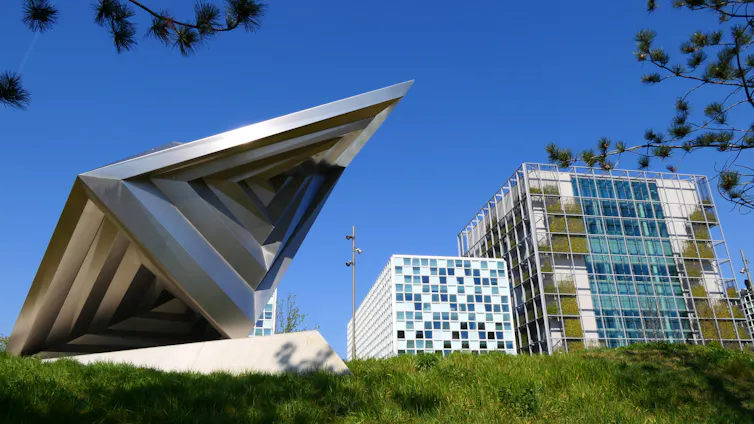 The International Criminal Court with a artistic monument in the city of the Hague
