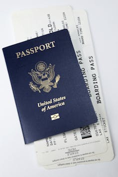 Passport and airline boarding pass tickets